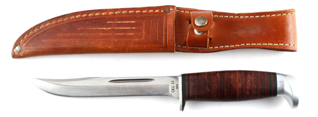 CASE XX KNIFE 316 5 SSP WITH LEATHER SHEATH: Fixed blade knife with a 5 inch blade, maker marked, leather wrapped grip, and steel fittings. Comes in Case XX leather sheath. Very good condition.