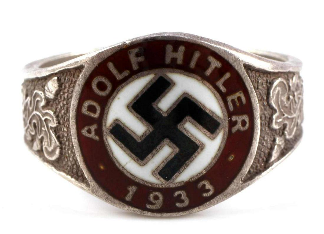 WWII THIRD REICH GERMAN ADOLF HITLER SILVER RING: Enamel emblem at front with Adolf Hitler 1933 and swastika at center, oak leaf design at sides, RZM and 900 marked to interior. Size 11, weighs 7.8 grams. Good condition.