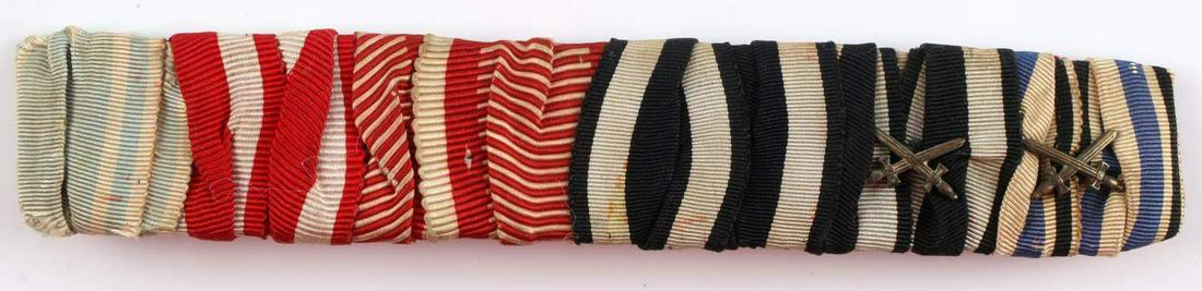 IMPERIAL GERMAN SIX PIECE DRESS RIBBON BAR: This lot contains a German Imperial 6 Piece Dress Ribbon Bar. From left to right the ribbons are as follows: Bavarian Officer Cross Ribbon, Austrian Merit Cross 1916-1918 Ribbon, Austrian Order of Mil