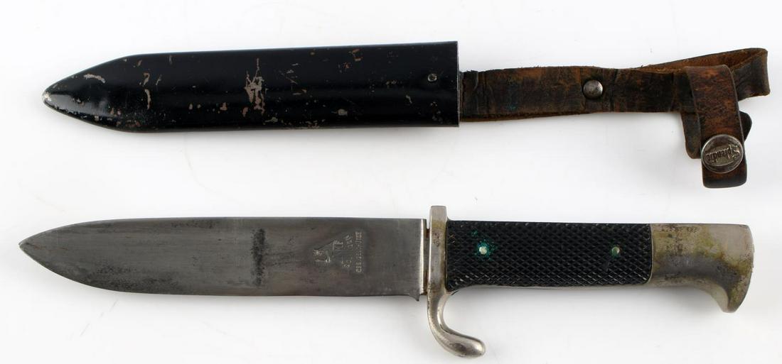 WWII GERMAN HITLER JUGEND YOUTH DAGGER W SHEATH: Features a 5.5 inch blade with logo Blut und Ehre! etched to blade, SMF Solingen Ges. Geschutzt engraved to other side, washer absent, black plastic grips and enamel diamond with swastika inlay (very 
