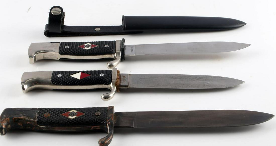 WWII GERMAN 3RD REICH LOT OF 3 HITLER YOUTH KNIVES: This lot contains 3 WWII German Hitler Youth Knives. One of these knives comes with a scabbard while the other two do not. These knives measure 9.5 inches long. Two of them are engraved on the blade "
