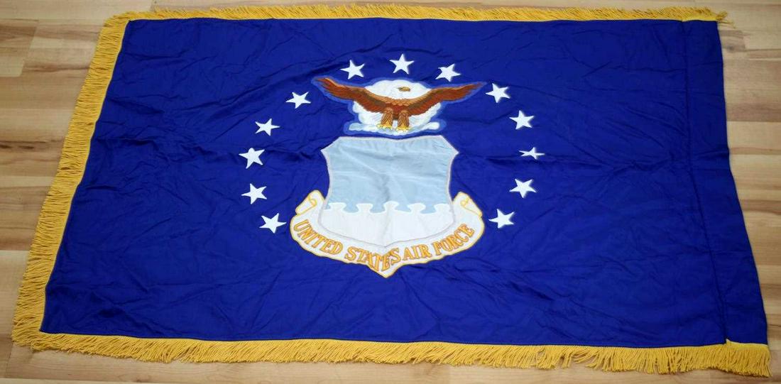 UNITED STATES AIR FORCE BLUE AND GOLD FRINGED FLAG: United States Air Force blue and gold fringed flag. The fringe runs along the top and bottom, featuring the USAF eagle in the middle. Measures 53 X 39 inches. Near excellent condition on this flag wit