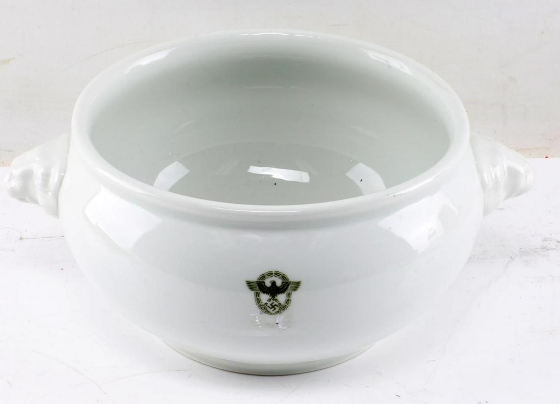 WWII GERMAN THIRD REICH POLIZEI SOUP TUREEN: Porcelain soup tureen with lion's head handles, Reichsadler in green to front, marked "Rhenania Dulsdorf" at bottom. Measures 13 inches long and 5.5 inches deep. Lid is absent. Very good condition.