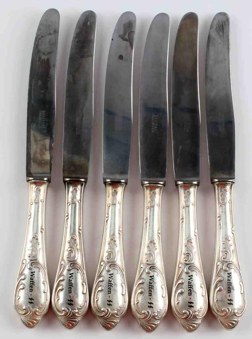 WWII GERMAN WAFFEN SS TABLE KNIVES LOT OF 6: This lot contains a group of six (6) WWII German Waffen SS Table Knives. Each knife has a marking "Rostfrei. Solingen" on the blade and "Waffen SS" on the handle. This lot is overall in good condition
