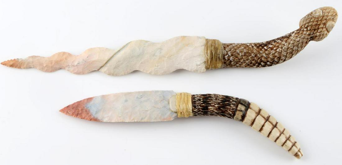 2 CLAUDE VAN ORDER HAND CARVED CHERT FLINT KNIFE: Two river chert knives hand carved and knapped by Claude Van Order. Dated 1989, near mint condition. Snake head knife measures 14 inches long. Blade measures 8 1/4 X 1 5/8 inches and handle measures 5