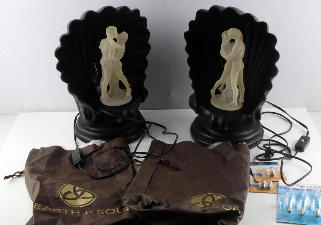 1970S DISCO ERA NUDE CLAM SHELL TABLE LAMP SET: Pair of vintage 1970's Disco Fever decor with a little Art Deco Revival. These clam shell table lamps feature rotating lucite nude figures. They measure 16x12x9 inches with a 9x4x4inch rotating nude f