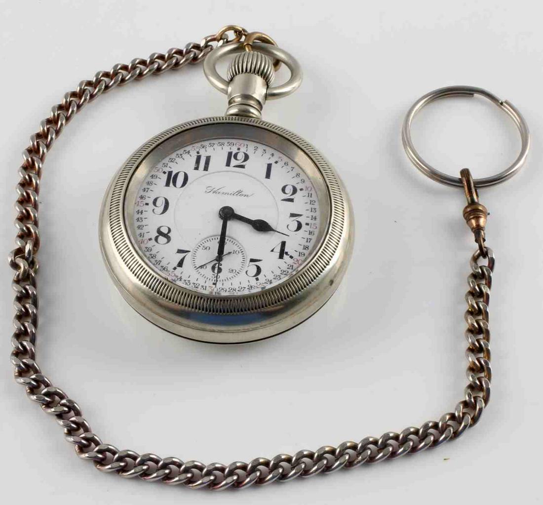 HAMILTON RAILROAD GAUGE POCKETWATCH 940 MOVEMENT: Hamilton railroad gauge 940 movement pocket watch with crystal measuring 48.54mm, with 21 jewels, internal case serial reads "987560", external case serial reads "77211" and is made by Illinois Watch 