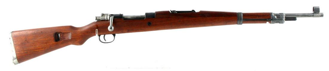 BOLT ACTION 1950S YUGO M48 8MM ZASTAVA RIFLE: Bolt action 1950's Yugo M-48 Zastava rifle chambered for 8mm. Barrel is 2 feet long and features a bright and clean bore. Rifle is 43 1/4 inches long in total, features serial #, model #, and crest. G