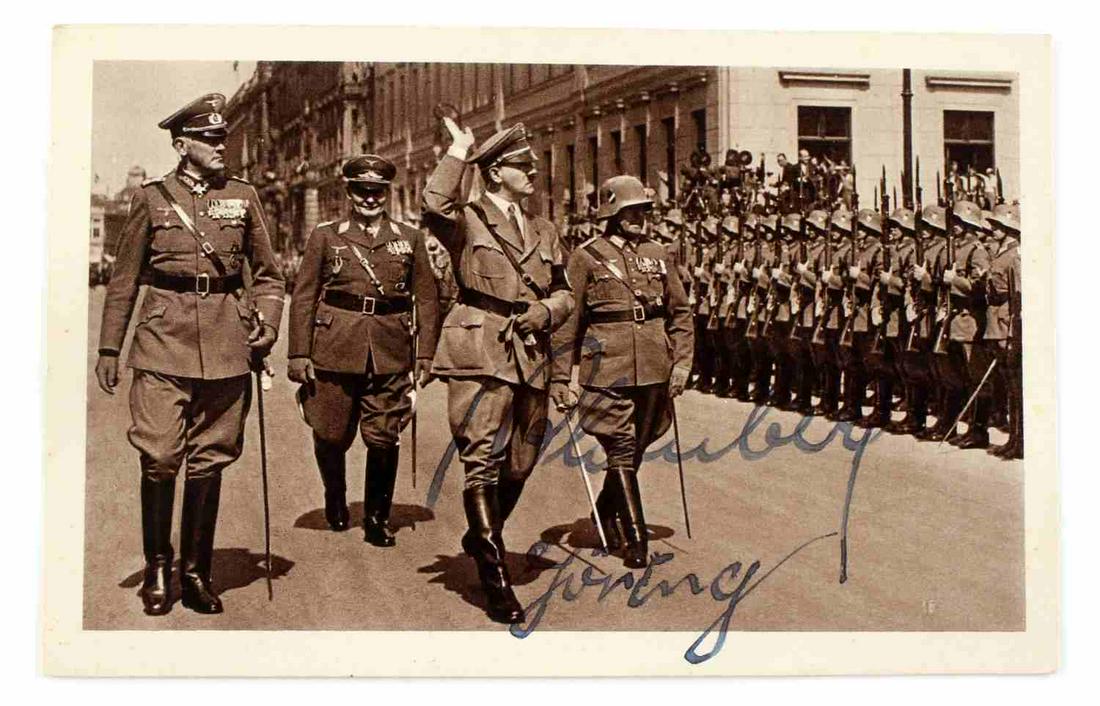 WWII GERMAN SIGNED PHOTO BY GORING & BLOMBERG: WWII German third Reich autographed photo signed by Hermann Goring and Reichsminister of War Werner von Blomberg. Photo measures 3 9/16 inches tall by 5 9/16 inches wide. Photo front and back in good 