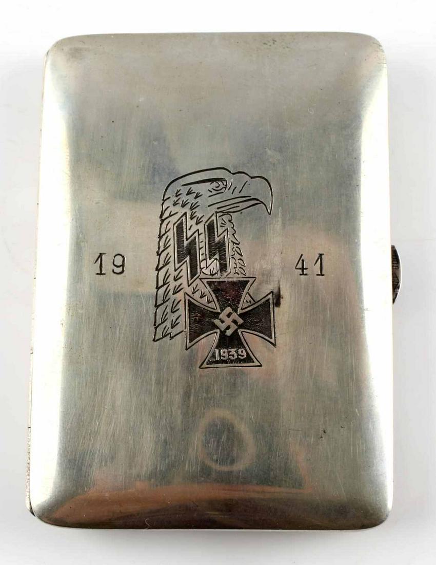 WWII GERMAN SS PANZER DIVISION CIGARETTE HOLDER: SS 1941 with eagle on the front. 1. SS - PZ. Div. on back. JB initials on the inside. Measures 3 1/4 x 2 3/8. Excellent condition.