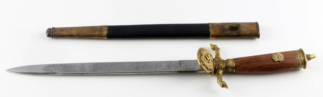 WWII GERMAN HERMAN GORING LONG HUNTING DAGGER: WWII German Third Reich long Hermann Goring styled Reichsjagermeister homage hunting dagger with sheath. Blade is 12 7/8 inches long and features etchings throughout including deer, a facsimile of Her