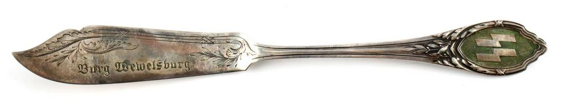 WWII THIRD REICH SS WEWELSBURG CASTLE SILVERWARE: SS Silver serving knife from Wewelsburg Castle. Measures 8 inches long. Very good condition with slight verdigris around SS logo.