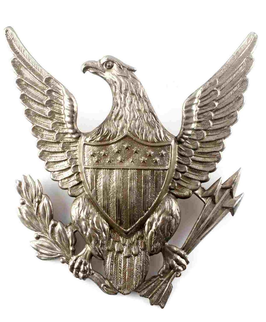 1880S US INDIAN WARS MILITARY SPIKE HELMET EAGLE: US Indian Wars Army 1880’s Military Spike Helmet Eagle Front Plate. Measures 4 1/8” wide by 4 1/4” tall. The front shows a spread winged eagle with a shield in the center of his chest. He is clu