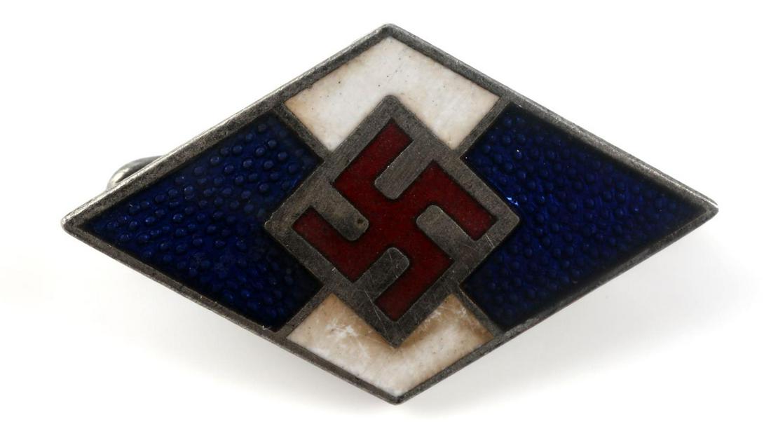 WWII HITLER YOUTH HJ MEMBERSHIP DIAMOND BADGE: WWII German Hitler youth HJ membership diamond badge. Reverse marked 'BM1/122 RZM'. Thin horizontal pin. Nickel construction with black, blue, and white enamel. Measures 25mm x 15mm. Unauthenticated, 