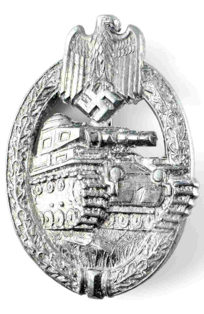 WWII GERMAN THIRD REICH PANZER TANK ASSAULT BADGE: WWII German third Reich Silver Panzer Tank Assault Badge measuring 2 3/8 inches tall by 1 5/8 inches wide. Reverse side is marked "HA" and features a Verticle pin back with a c-clamp. Unauthenticated,