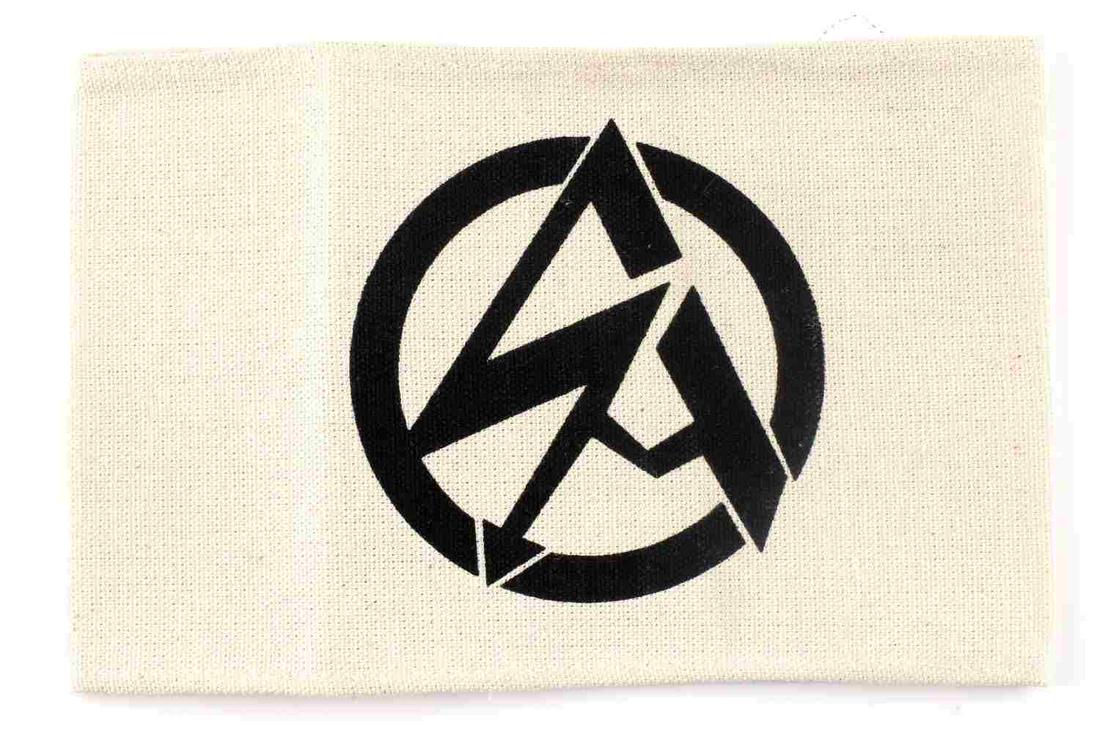 WWII SA STURM ABTEILUNG BROWN SHIRTS ARMBAND: German WWII SA Sturm Abteilung Brown Shirts Swastika Arm Band. Measures 7 1/2” wide by 4 3/4" tall. The front shows the SA emblem in the center of a white back ground. One piece machine sewn printed