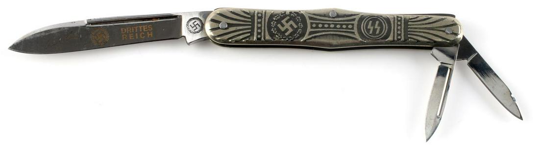 WWII GERMAN THIRD REICH WAFFEN SS POCKET KNIFE: German WWII Waffen SS / Swastika Pocket Knife. Measures 7 7/8” long with all three blades open. The largest blade is signed with a facsimile ‘Adolf Hitler’ signature along with a swastika and ��