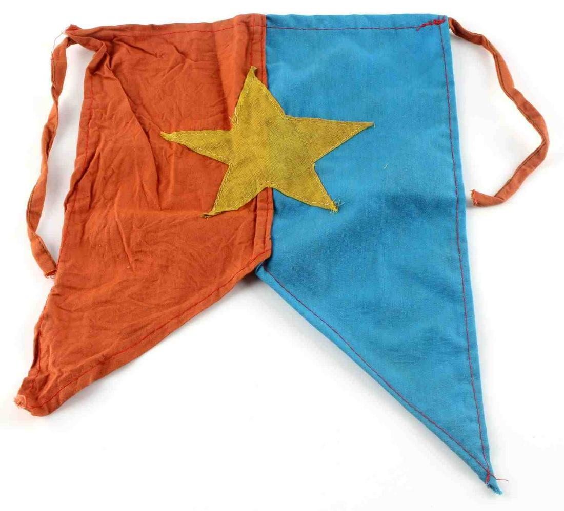 VIETNAM ERA VIET CONG VC COMBAT BAYONET FLAG: Vietnam Era Viet Cong VC Combat Bayonet Banner Flag. Measures 13 1/8 inches wide by 10 1/8 inches tall plus the two cloth tie strings. Shows a yellow star in the center of a blue and orange swallow ta