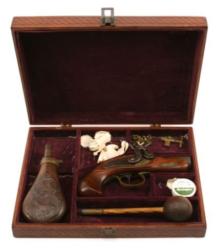 CASED DERINGER TYPE PERCUSSION PISTOL: Black powder set comprising a .45 cal, single shot percussion pistol with 3 inch octagonal (rifled) barrel, lock with foliate engraving and marked "Derringer Philadelphia", toned overall. A powder fla
