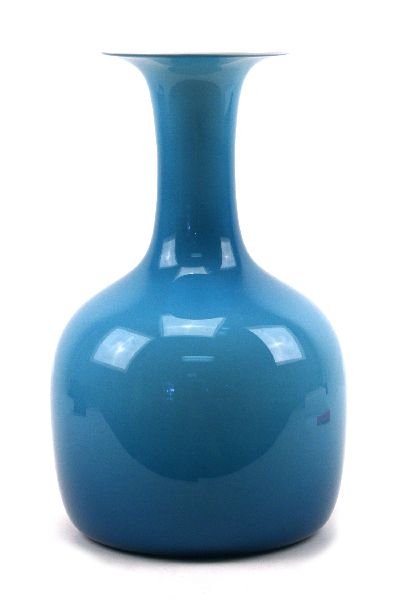 KASTRUP HOLMEGAARD DUTCH ART GLASS VASE: Piece is a serene blue Danish made 13 x 8inch art glass vase by Kastrup Holmegaard in pristine condition with white interior and original labeling sticker at the base.