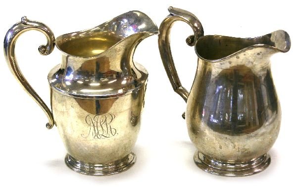 WATSON & WALLACE STERLING SILVER PITCHER LOT OF 2: Lot contains two elegant 9 x 9inch vintage sterling silver pitchers in excellent condition, one made by Wallace weighing 19.78 ozt and monogrammed "MLR" with "WALLACE STERLING 201" "41/2 PINTS" on the