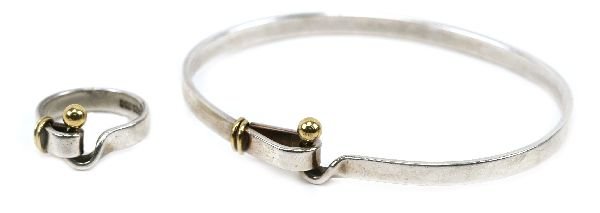 TIFFANY & CO 18K/SS BRACELET & RING LOT OF 2: Tiffany & Co. jewelry lot of 2. One 18K yellow gold and sterling silver Bracelet, marked "Tiffany&Co 925 750". One 18K yellow gold and sterling silver ring, marked "Tiffany&Co 925 750". Both items are