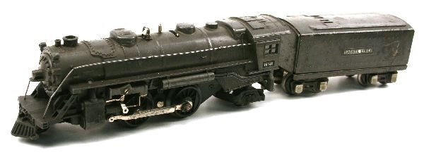 ALL METAL LIONEL TOY TRAIN & TENDER C1938-42: All metal alloy engine and tender by Lionel. Stamped "Lionel 027" underneath engine. Engine measures 10 inches in length, tender measures 6 inches in length. Overall, in very good condition with some