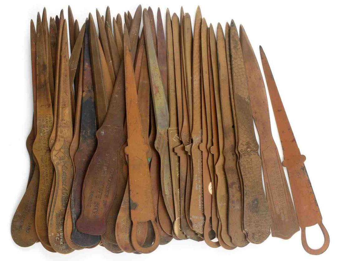 LOT 51 BRONZE ADVERTISING LETTER OPENERS VINTAGE: Banks, service companies, steel companies, attorneys, insurance, manufacturing companies, and more. All measure about 8 inches long. Good vintage condition.