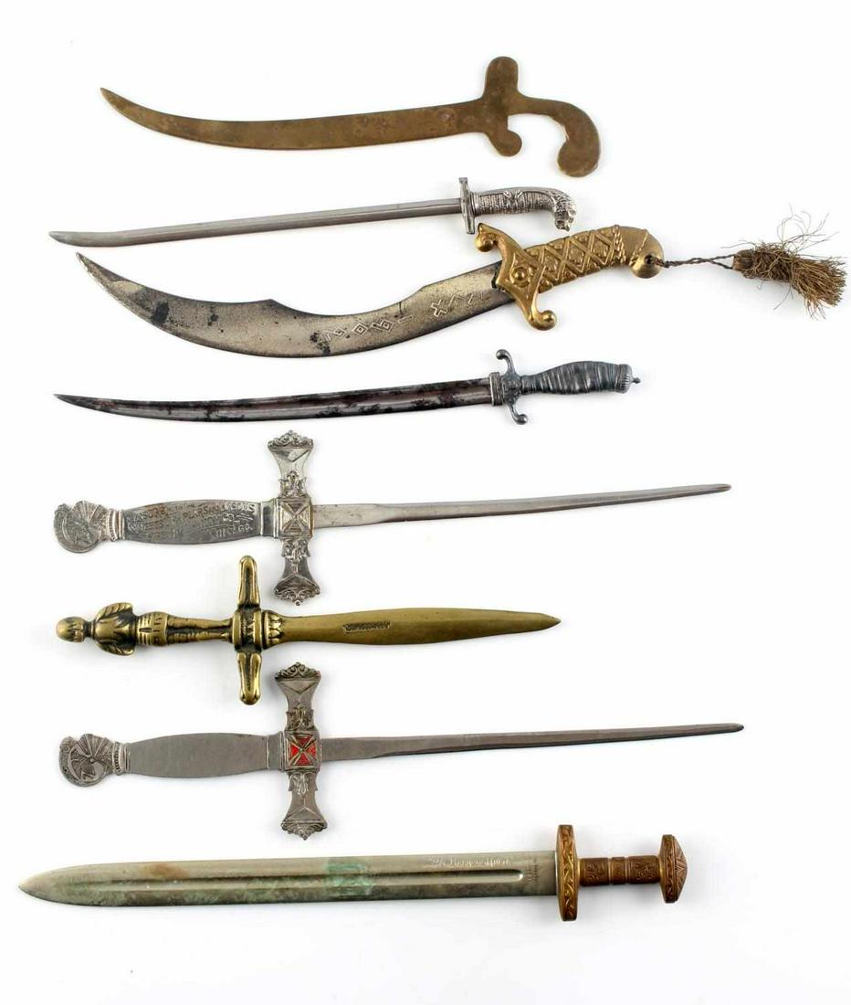 LOT OF 8 VINTAGE METAL SWORD LETTER OPENERS: Mixed metals, one Vikingswork Norway, one German, Carnival New Orleans, and others. Measure 7 - 9.5 inches. Good condition.