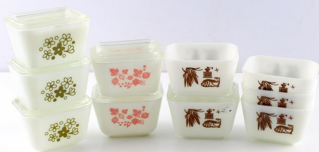 1960S & 1970S VINTAGE PYREX REFRIGERATOR DISHES: All are the small 501 B 1 1/2 cup refrigerator dishes in patterns of Pink Gooseberry, Early American and Spring Blossom. 10 containers and 6 clear lids all in good pre owned condition.