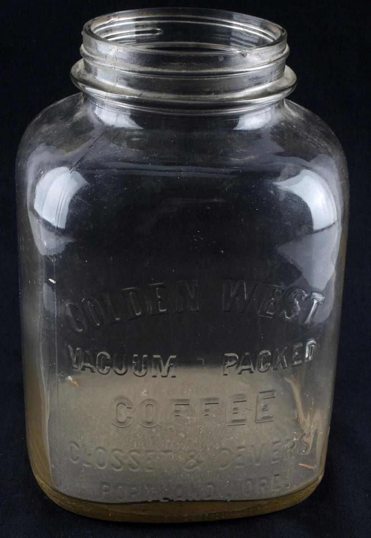 VINTAGE GOLDEN WEST COFFEE GLASS STORAGE JAR: Golden West Vacuum Packed Coffee Glass Storage Jar. The jar also reads "Closset and Devers Portland, Oregon". Measures 5 X 9 X 5.5 inches. Mouth of jar measures 3.75 inches in diameter. Very good cond