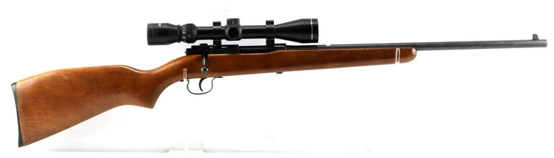 WINCHESTER MODEL 121 BOLT ACTION RIFLE .22 S L LR: Features a 21 inch barrel with bright clear bore, fine wood stock, wood butt, maker marked to left side of barrel, 3-9 X 40 Tasco scope attached, fixed front sight. Scattered oxidation. Good condition