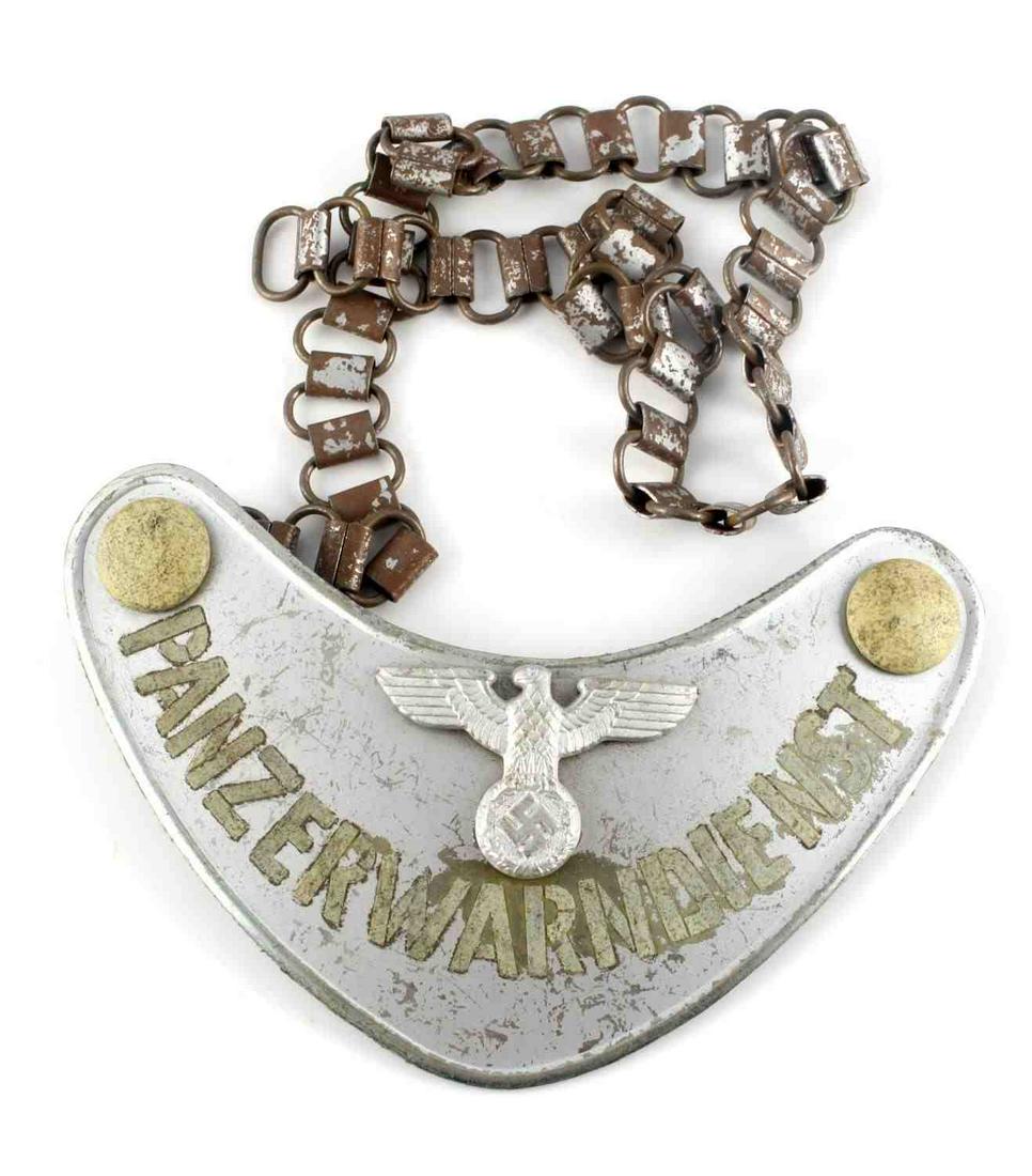 WWII GERMAN VOLKSSTURM PANZERWARNDIENST GORGET: WWII German volkssturm panzerwarndienst gorget with chain. Steel with silver finished and NSDAP eagle to top. Non fluorescing felt green backing to reverse with two hooks one marked "C.E. Juncker Berl
