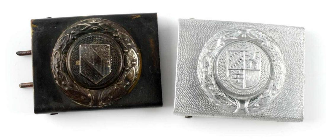 LOT OF 2 WWI EUROPEAN BELT BUCKLES BRASS ALUMINUM: Lot of 2. One brass with early wreath and shield at center, one aluminum with same wreath and 4-panel shield at center. No markings. Good condition.