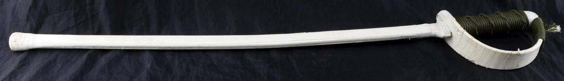 US NAVAL SWORDSMANSHIP TRAINING CUTLASS SWORD: Measures 45 inches in total length complete with D-guard and threaded grip. Has electrical tape affixed in a way to provide cushioning of sorts.