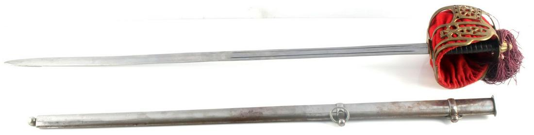 CEREMONIAL SCOTTISH CLAYMORE PARADE DRESS SWORD: Ceremonial Scottish claymore parade dress sword with scabbard. Blade is 33 1/4 inches long with two blood grooves on each side. Blade in good condition with some dulling and bruises on and near the ti