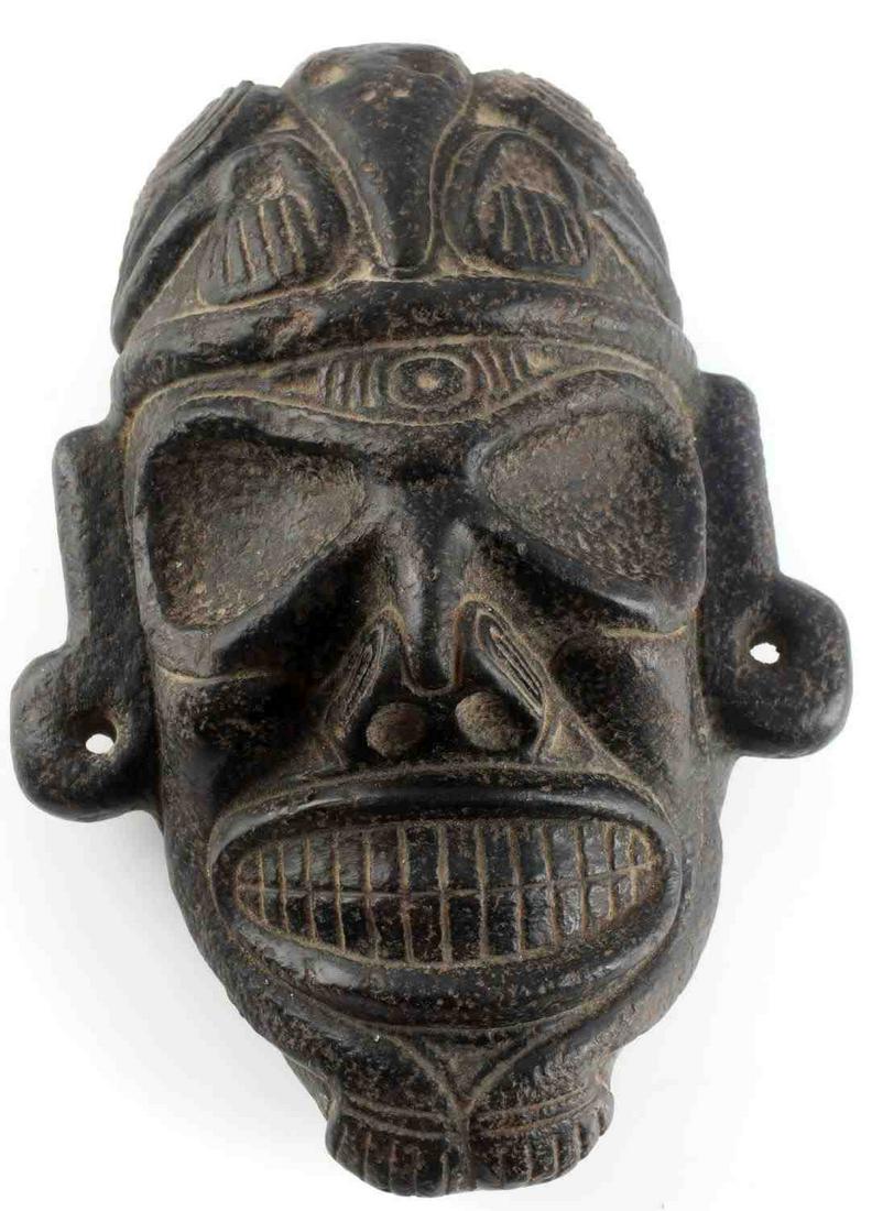 PRE COLUMBIA TAINO MAGNETITE HEAD W BIRD ACCENTS: Following Taino design models for complicated themes this head has a full bird with bird head wings draped over the top of the initial head. Subjects nose is turned up suggesting a bat like influence.