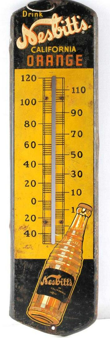 VINTAGE ADVERTISING NESBITT'S SODA THERMOMETER: TIN 923-Q, official Nesbitts orange drink advertising thermometer sign 27 X 7 inches, some flaking and loss to paint and clear coat, minor rusting and pitting, bottom rim denting.