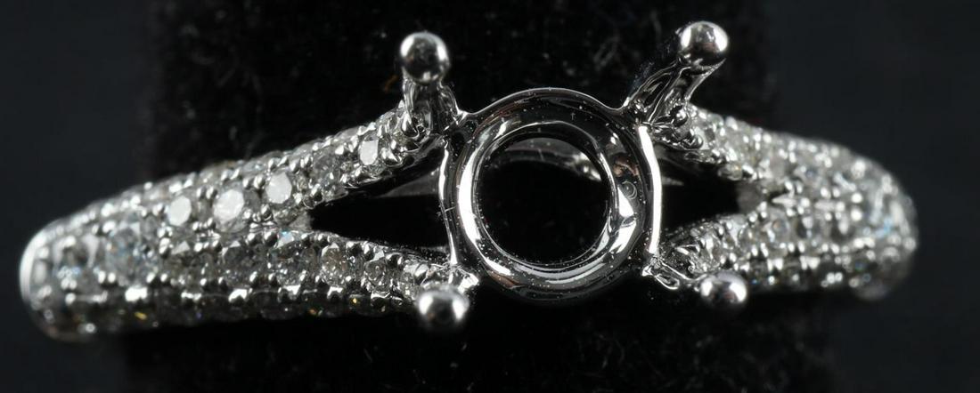 18 KT GOLD DIAMOND ENGAGEMENT RING SETTING BLANK: Engagement ring blank 4 prong setting 18 karat white gold diamond ring .Size 6.5, Total weight 4 grams, TCW diamonds 0.52, G, VS2. Condition: New