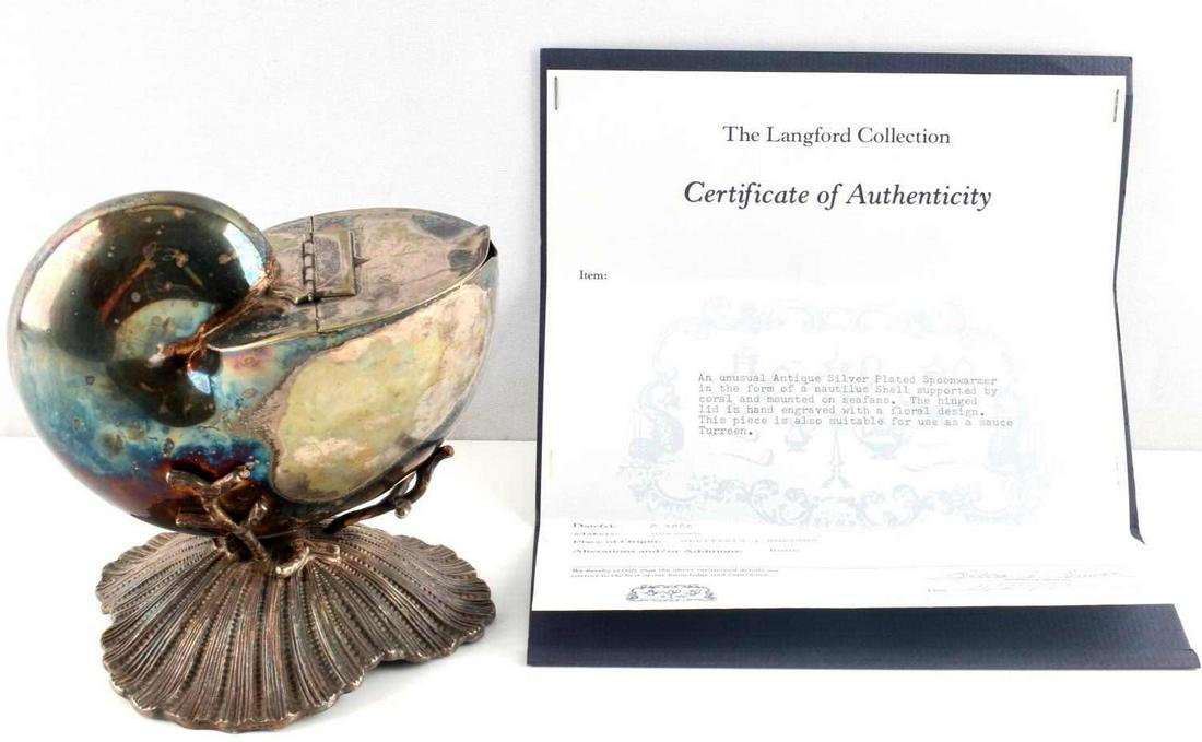 VICTORIAN ANTIQUE SILVER PLATED SPOON WARMER W COA: Circa 1865, Sheffield, England, Langford Collection. Victorian silver plated chambered nautilus spoon warmer with hand chased cover, in a nautilus shell supported by coral, mounted on Sea Fans. Dimens