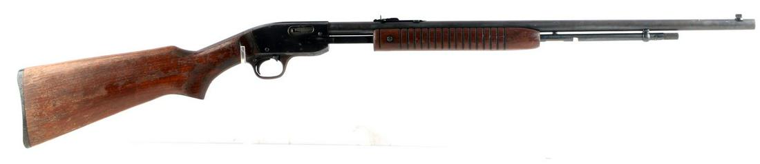 SAVAGE MODEL 29B PUMP ACTION RIFLE .22 CALIBER: Blued steel with scattered oxidation, 24-inch heavy barrel, maker marked to top of barrel, model marked to left side receiver, grooved wood forestock, wood rear stock and butt. Fixed front and dovetai
