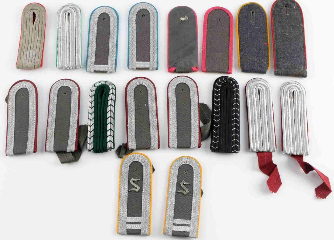 LOT OF 12 THIRD REICH WWI WWII SHOULDER BOARDS: Lot of red, green, pink, yellow, and teal colored piping German shoulder boards (Transport, panzer, engineer, recon, veterinary, mountain/light/motorized infantry). Very good condition. Dates range fr
