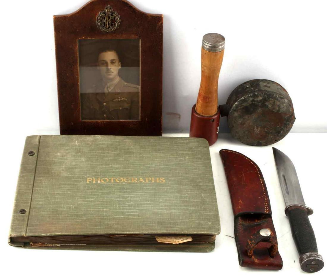 WWII CONFEDERATE LOT RAF SCRAPBOOK PHOTO KNIFE: Lot includes: newspaper clipping scrapbook of RAF officers during WWII, framed photo of RFC officer, Cattaraugus knife with sheath, small Confederate canteen, and an inert stick grenade. Condition var