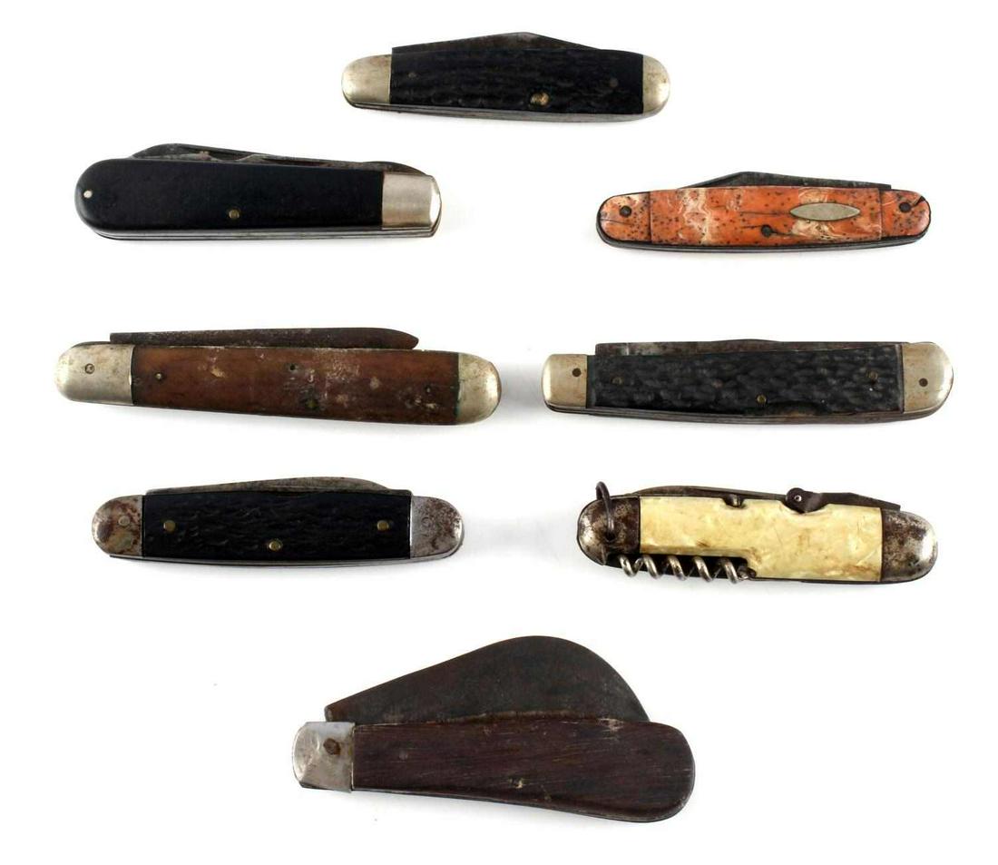 LOT OF 8 VINTAGE POCKET KNIVES ANTLER COMPOSITE: Lot of 8 pocket knives with various grips. Steel. Measurements range 5 1/2 - 8 inches. Good condition with rust on most.0