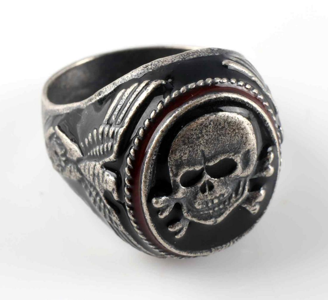 WWII GERMAN WAFFEN SS PANZER DIVISION SILVER RING: WWII German Waffen SS Panzer Division "Totenkopf" silver ring. Has silver/ maker's mark on outside band of the ring. Size 10.5. Very good condition. Unauthenticated; sold as is.This lot has a reserve.