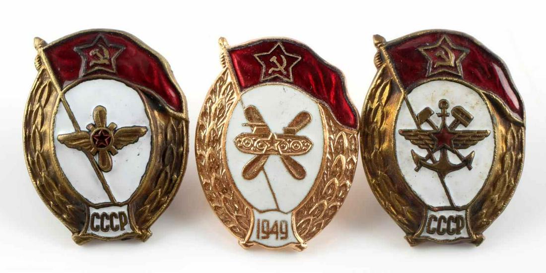 LOT OF 3 COLD WAR SOVIET COLD WAR ERA BADGES: 3 Cold War era graduation of military academy badges. Very good condition. Unauthenticated, sold as is. Measures 1 1/2 inches diameter.This lot has a reserve.