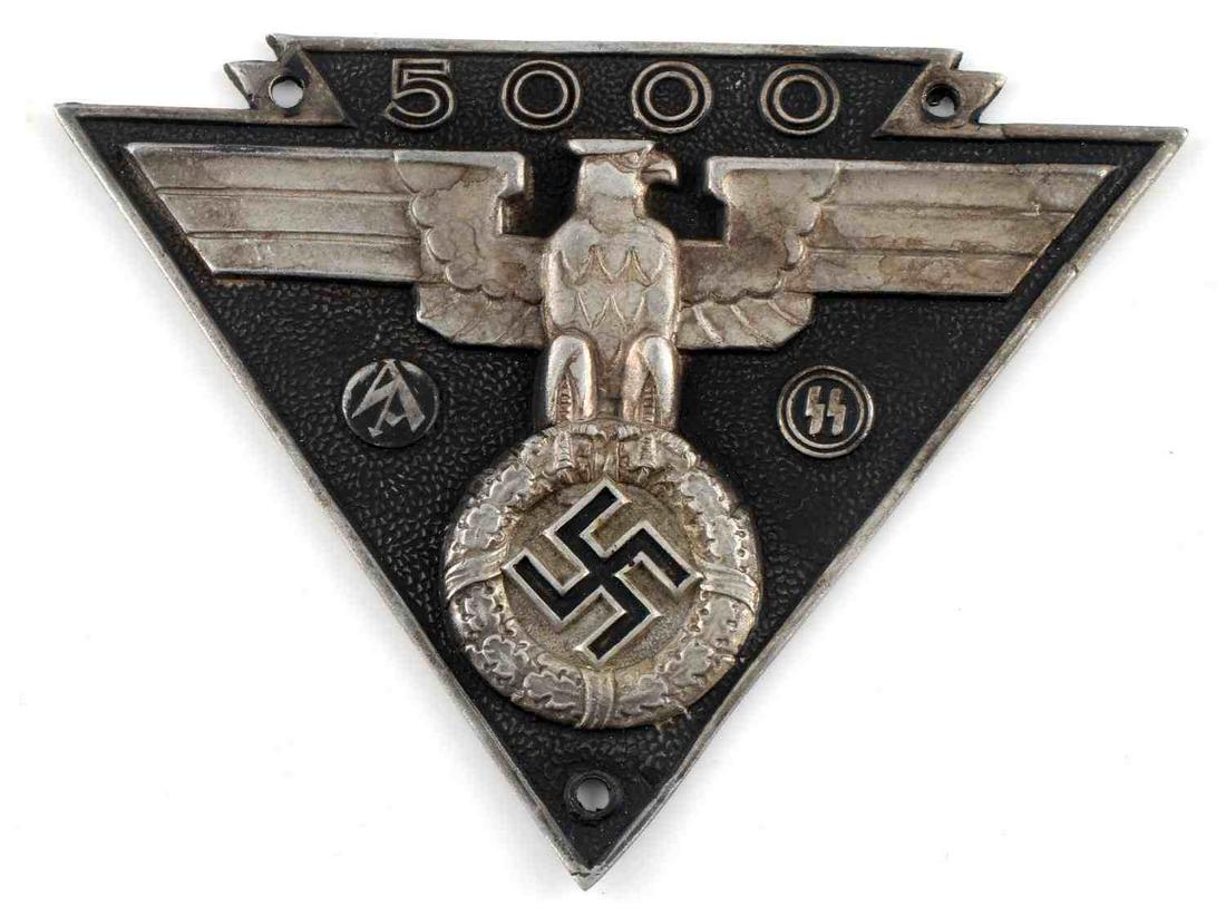 WWII GERMAN SA SS MILITARY BIKERS AWARD PLAQUE: WWII German SA and SS military bikers' award plaque. Reichsadler to center with "5000" above, SA and SS runes to both sides with pebble black background. Aluminum construction. 4 1/2 X 3 1/2 inches. S