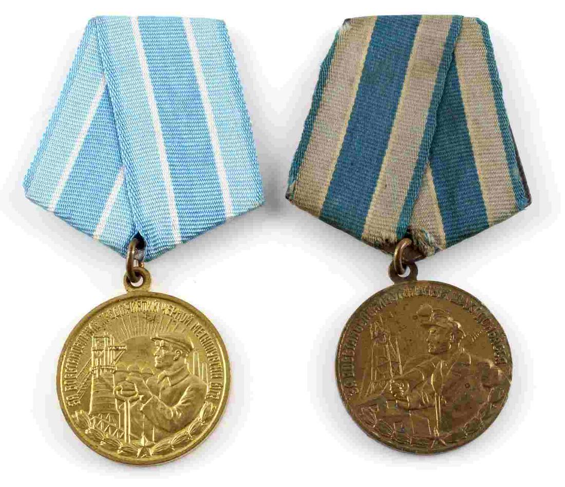 GROUP OF 2 SOVIET RUSSIAN CIVILIAN WORK MEDALS: Group of 2 Soviet Russian civilian work medals. "For the Restoration of Donbass Coal Mines" and "For the Restoration of the Black Metallurgy Enterprises of the South" medals in this group. Very good c