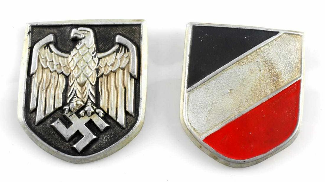 WWII GERMAN SET OF 2 HEER PITH HELMET SHIELDS: Set of 2 WWII German shields for the heer pith helmet. Both feature two prongs on back. Some oxidation and discoloration on front and back of shields. Measure 1.5 inches. Very good condition. Unauthen