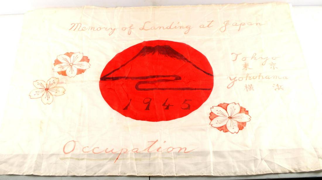 WWII JAPANESE LANDING AT JAPAN COMMEMORATIVE FLAG: WWII Landing at Japan commemorative silk flag. Reads "Memory of Landing at Japan 1945 Occupation". Features Mt. Fuji inside a rising sun. Measures 35 X 27.5 inches. Does not fluoresce under blacklight